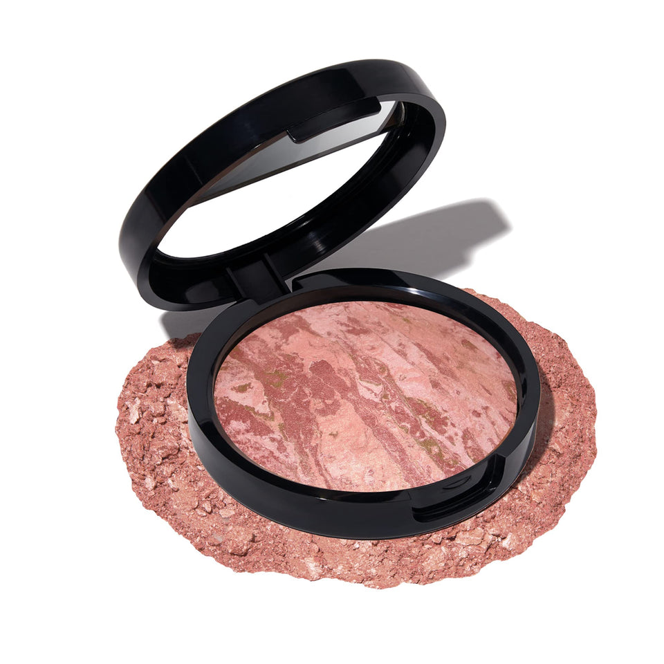 LAURA GELLER NEW YORK compact top view showing marbleized finish and easy grab