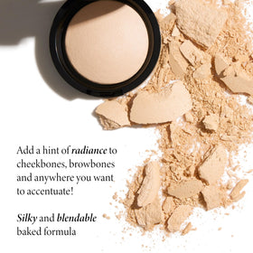 LAURA GELLER NEW YORK powder being applied to cheek with benefit of lifted features