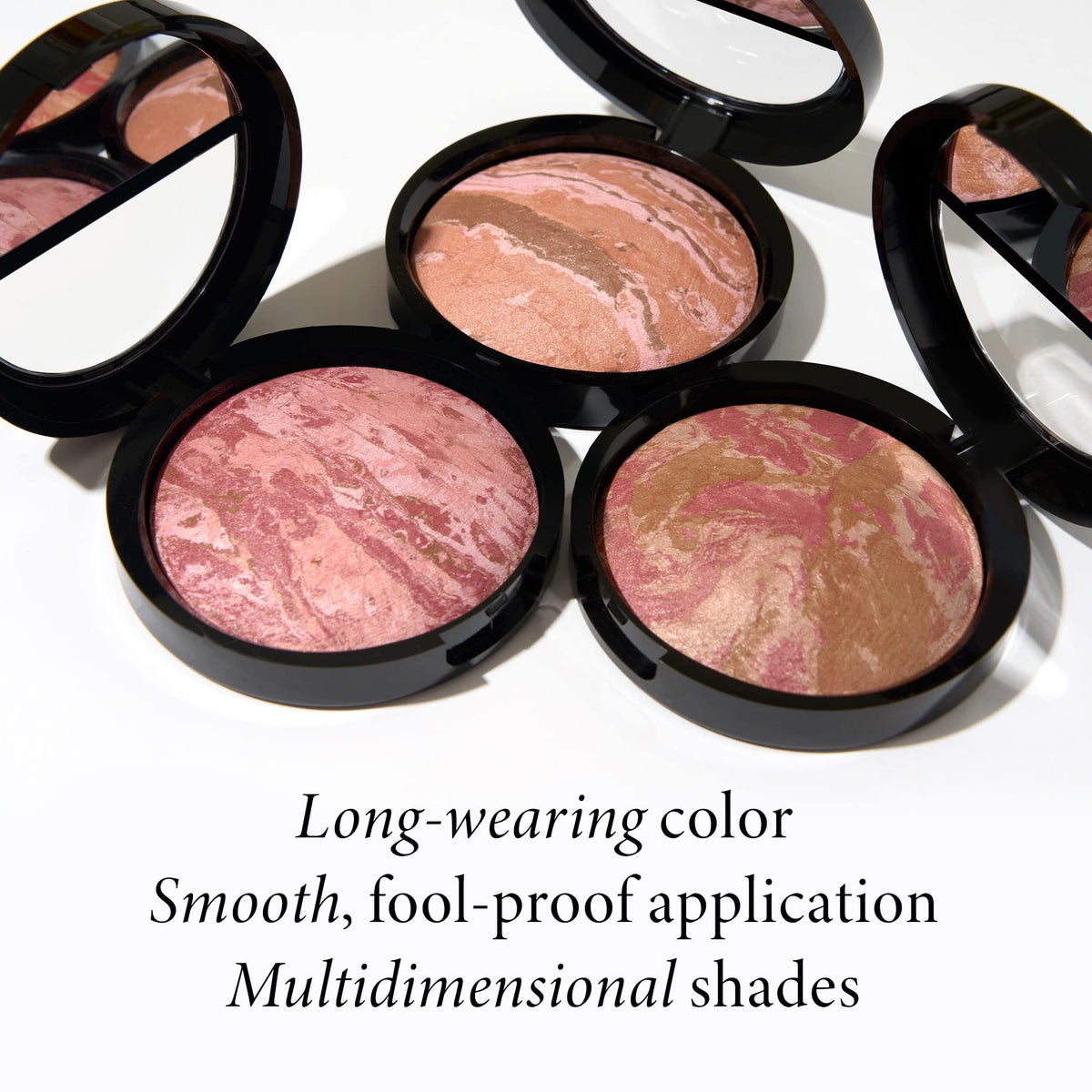 LAURA GELLER NEW YORK brush picking up mixed pigments for instant sculpt and flush