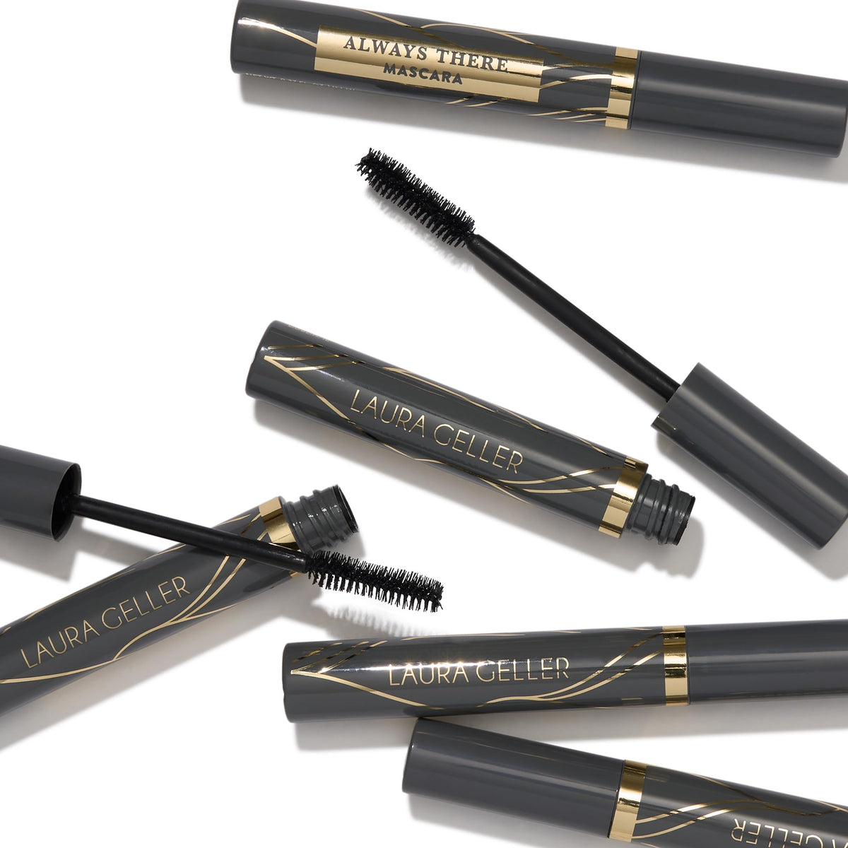 LAURA GELLER NEW YORK opened tube showing creamy formula ready for layering benefits