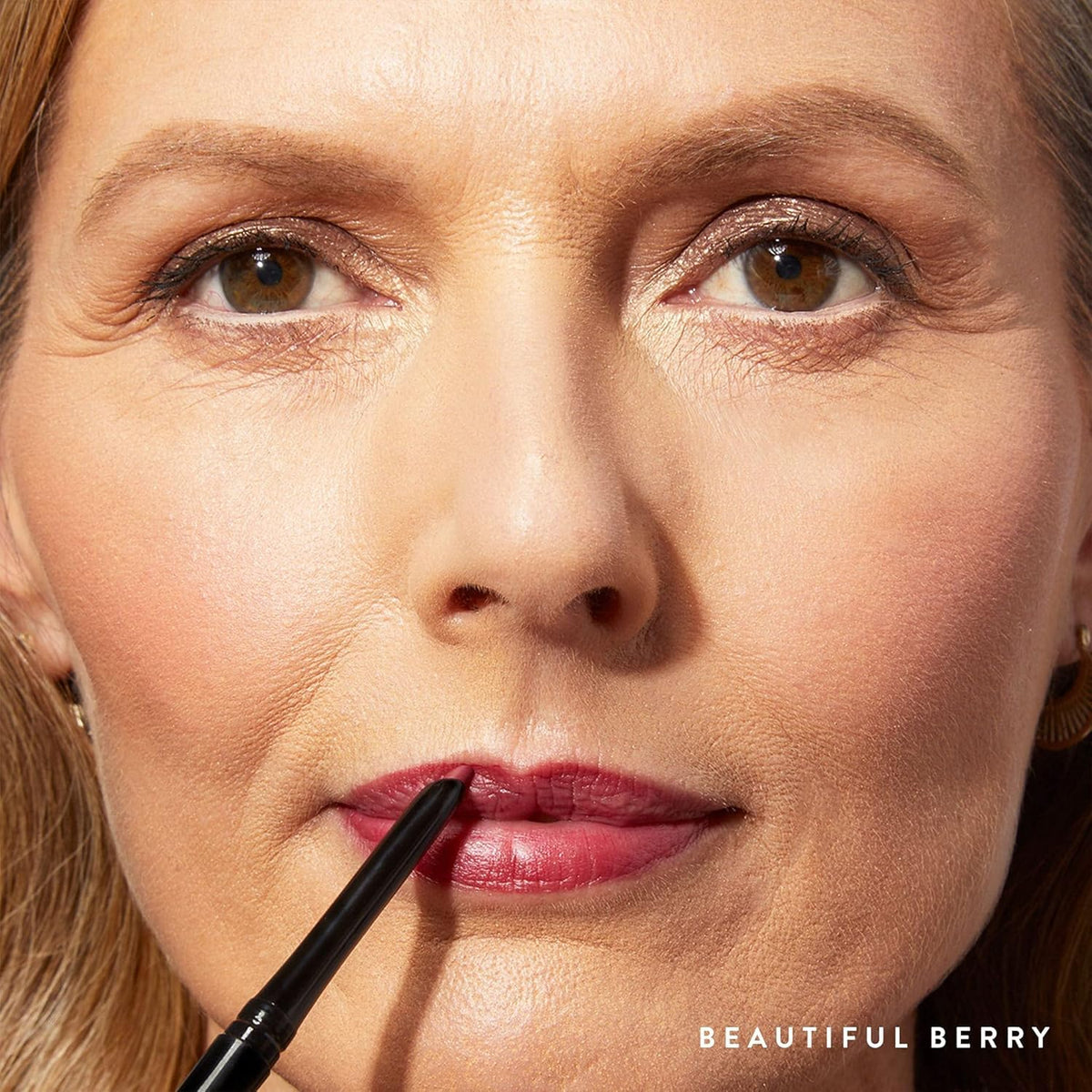 LAURA GELLER NEW YORK berry swatch on palette showing true color and buildable pigment