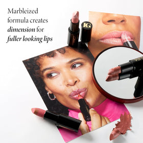 LAURA GELLER NEW YORK lips wearing Prego applied from center out for natural finish
