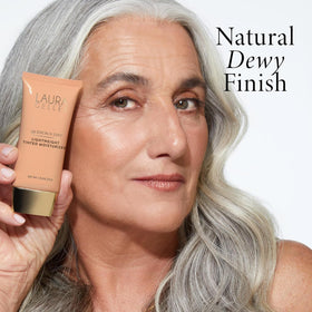 LAURA GELLER NEW YORK blending with brush to show buildable coverage benefit
