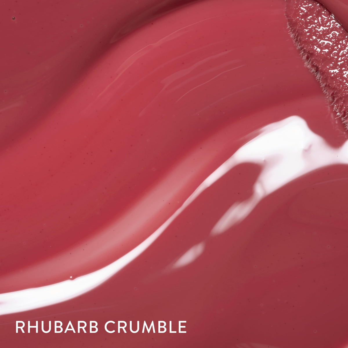 LAURA GELLER New York gloss on lips in use giving luminous, fuller-looking lips