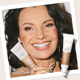 LAURA GELLER NEW YORK creamy primer texture close-up demonstrating smooth glide