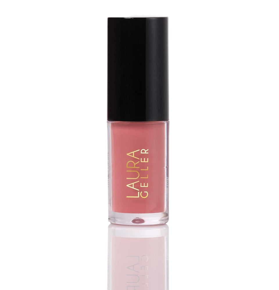 LAURA GELLER NEW YORK front packaging showing glossy tinted lip oil benefit