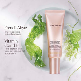 Laura Mercier application with fingertips illustrating fast, skin-like blending benefit