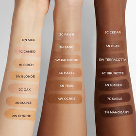 laura mercier pump dispenses blurred matte tint demonstrating easy application