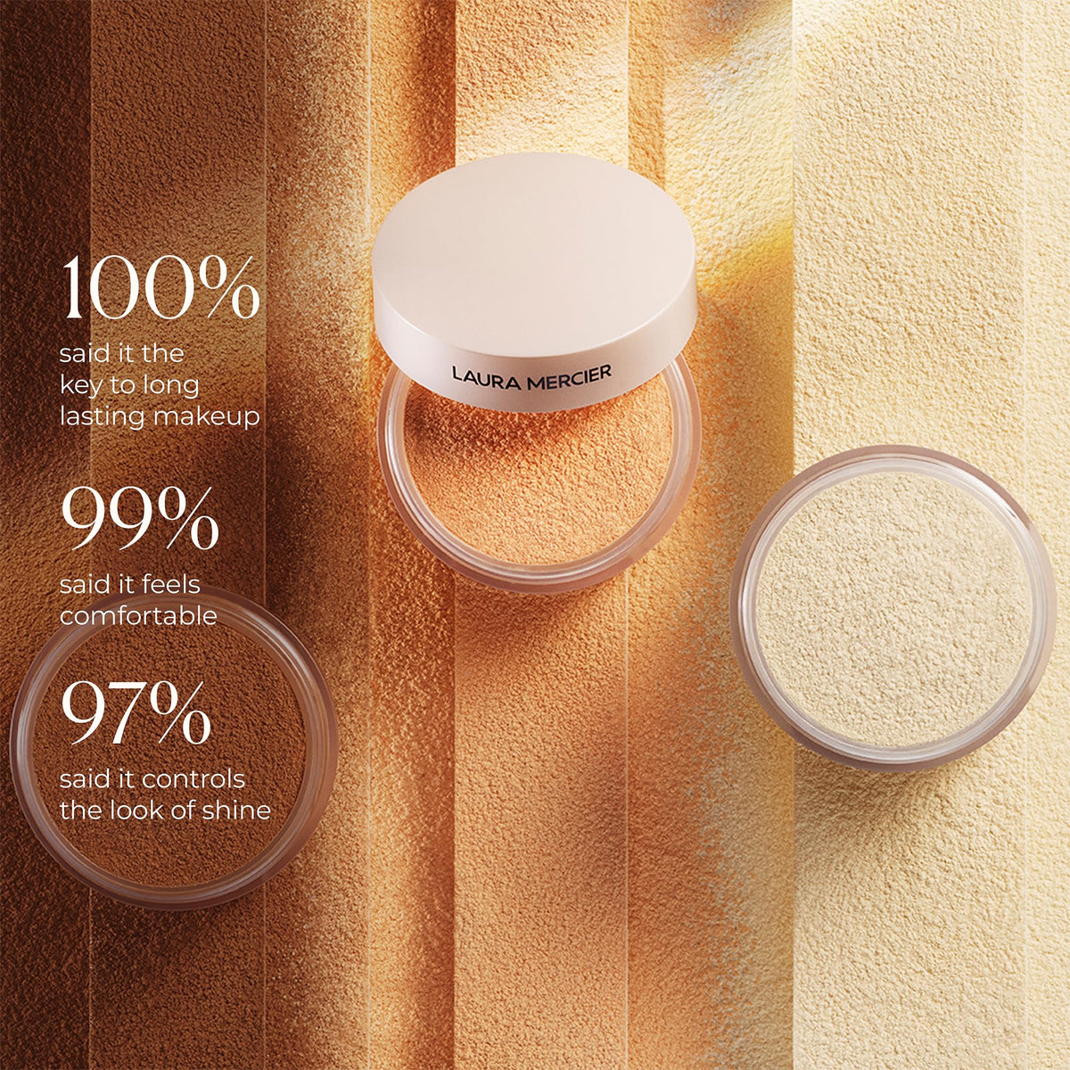 Laura Mercier brush applying powder across cheek for soft-focus finish