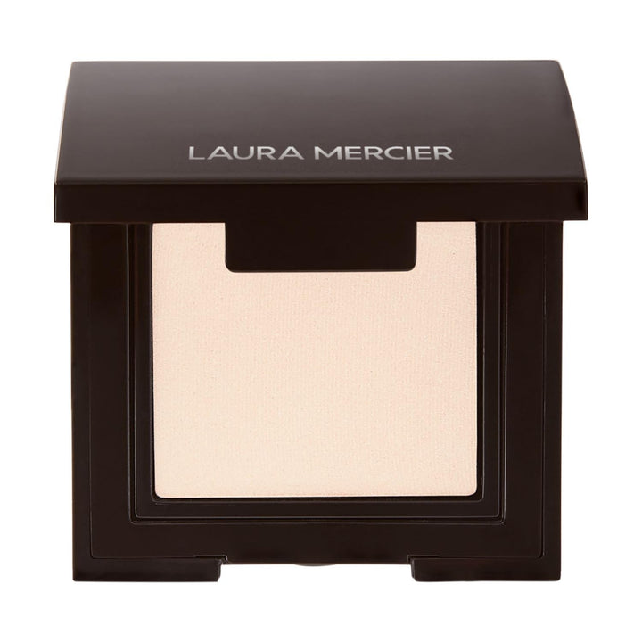 Laura Mercier compact front view showing shade and secure packaging for travel