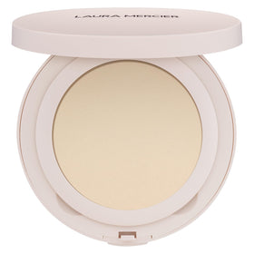 Laura Mercier compact front view showing sleek packaging and easy portability