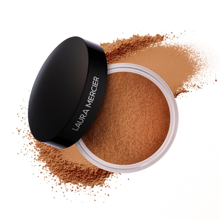 Laura Mercier front packaging showing compact glossy jar and brand clarity benefits