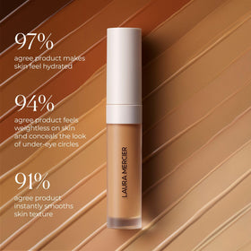Laura Mercier open cap with serum drop highlighting hydrating formula