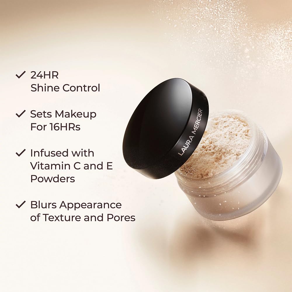 Laura Mercier loose powder applied on skin close-up for a softened, pore-blurring effect