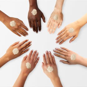 laura mercier swatch four shades on arm illustrating shade range and true tone
