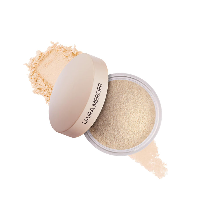 Laura Mercier mini front packaging shows compact, travel-friendly design and brand