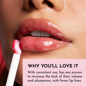 Lawless gloss layered over lipstick demonstrating enhanced shine and color vibrancy