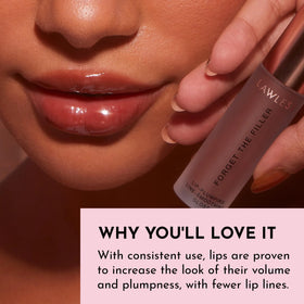 LAWLESS gloss layered over lipstick adding glassy shine and dimension to color