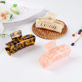 LAXIZAR clips on a bathroom counter showing practical use and quick styling