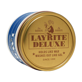 Layrite cream on fingers being applied for quick styling and natural hold
