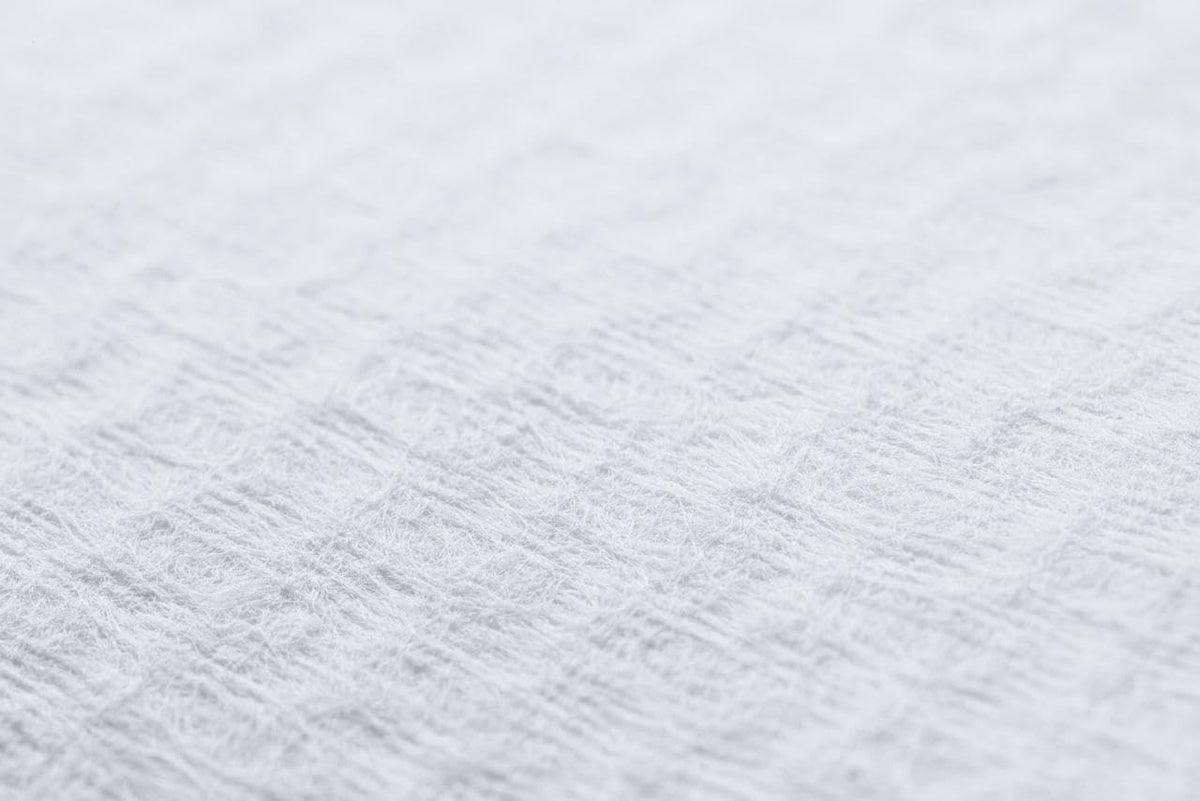 Le Visage towel wiping a baby face showing gentle, safe use benefit