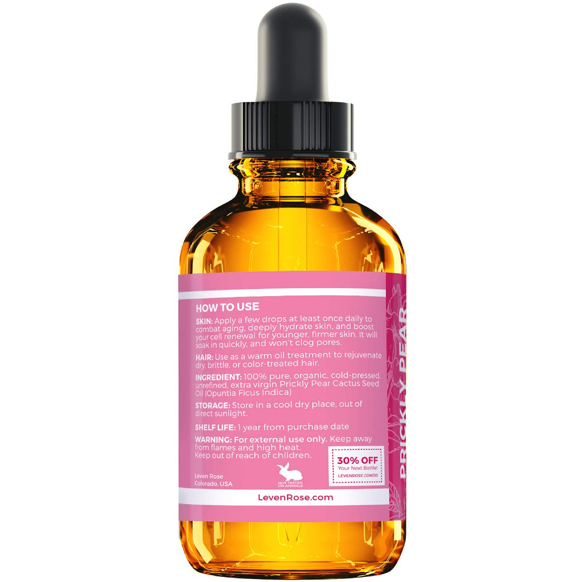 Leven Rose applying oil to face as nighttime hydration boost