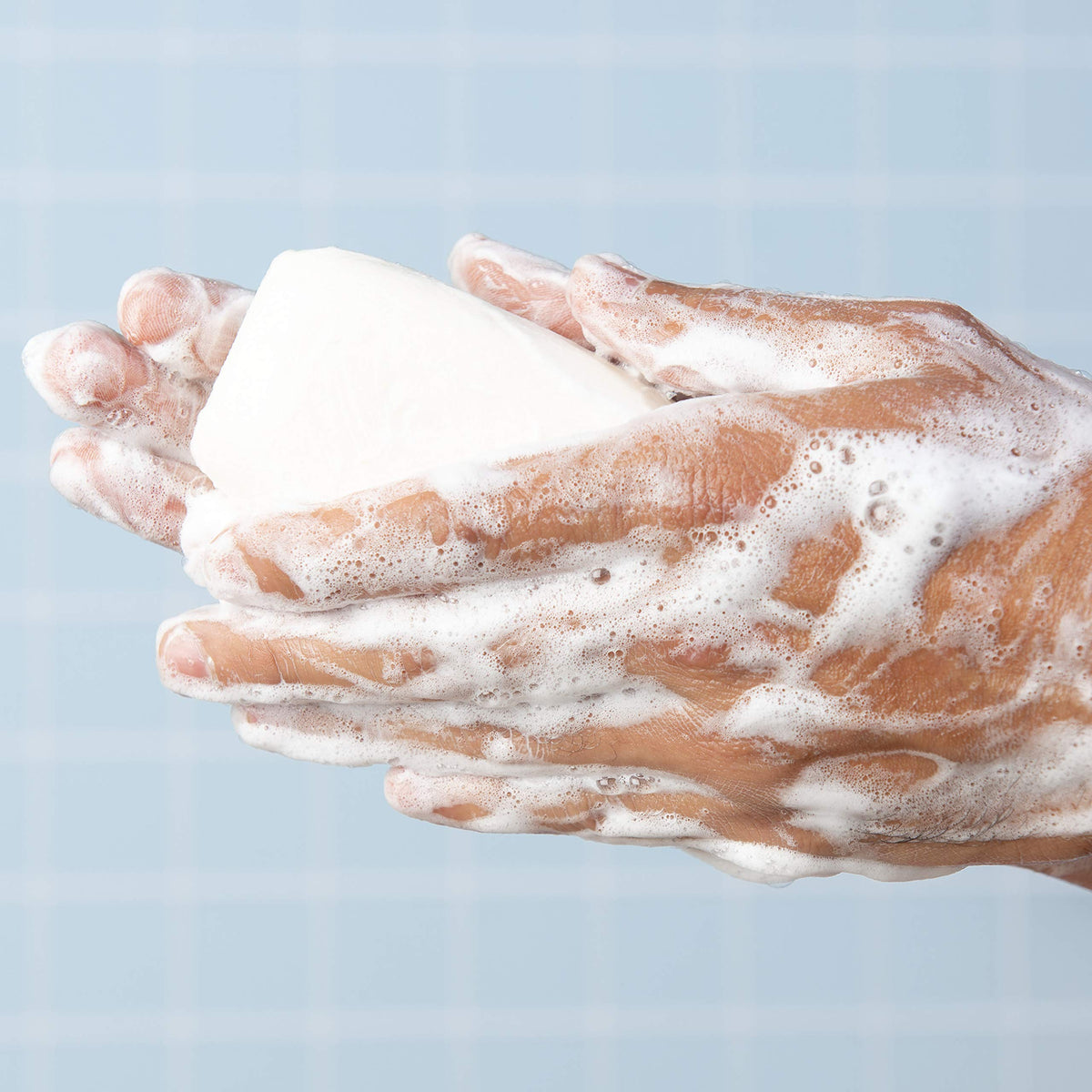 Lever 2000 soap bar close-up texture producing rich lather for gentle cleansing