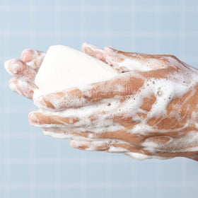 Lever 2000 soap bar close-up texture producing rich lather for gentle cleansing