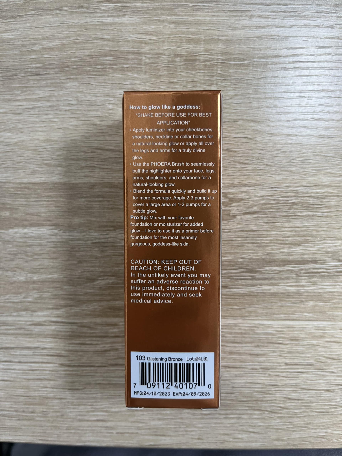 Lezero 1oz next to a coin to show compact travel-friendly size benefit