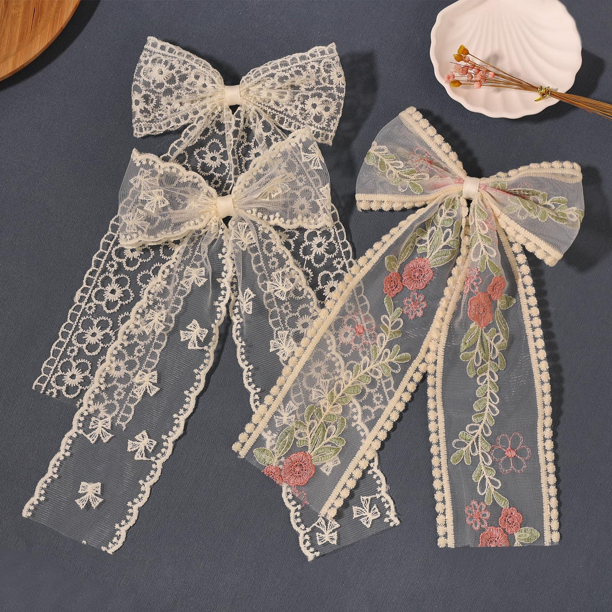LFOUVRE bow used in a half-up hairstyle creating romantic texture