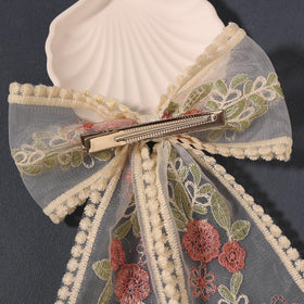 LFOUVRE fabric texture close-up showing soft lace and durable finish