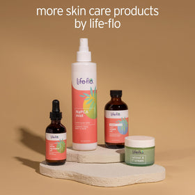 Life-Flo 8 oz bottle next to common items showing portable size