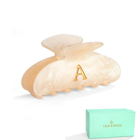 LILIE&WHITE clip front view in golden gift box shows polished presentation