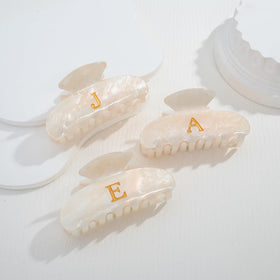 LILIE&WHITE side profile showing clasp mechanism for reliable hold