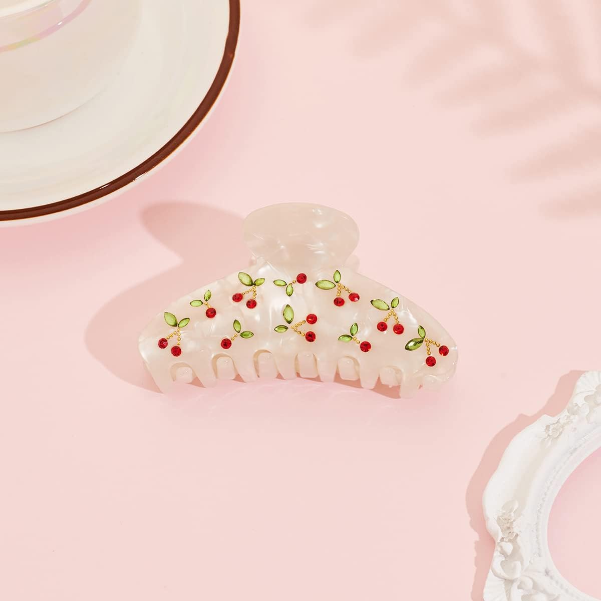 LILIE&WHITE held in hand to show compact size and lightweight benefit