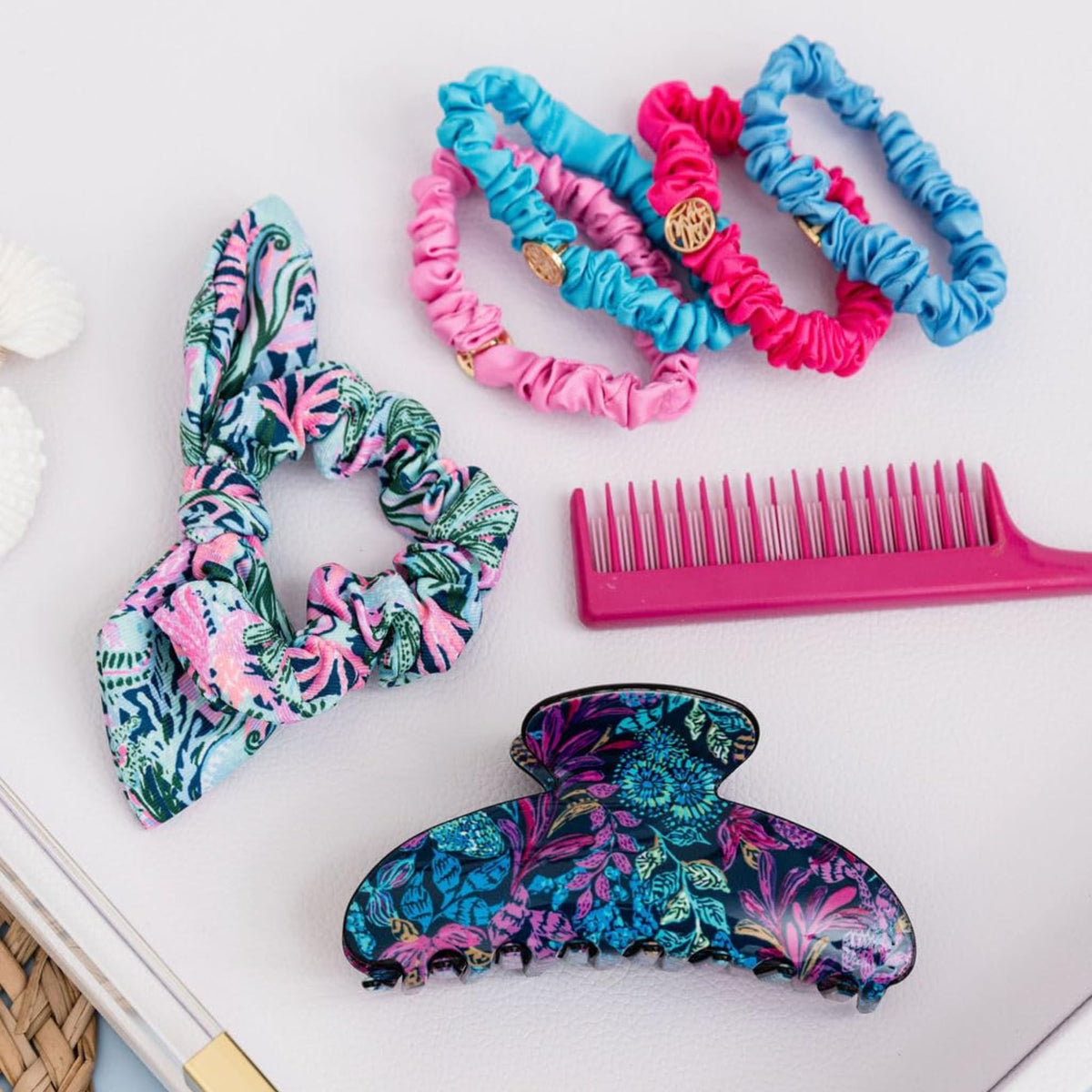 Lilly Pulitzer scrunchie worn on wrist as accessory for quick styling benefit
