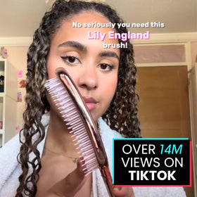 Lily England brush detangling wet curly hair demonstrating gentle, smooth glide