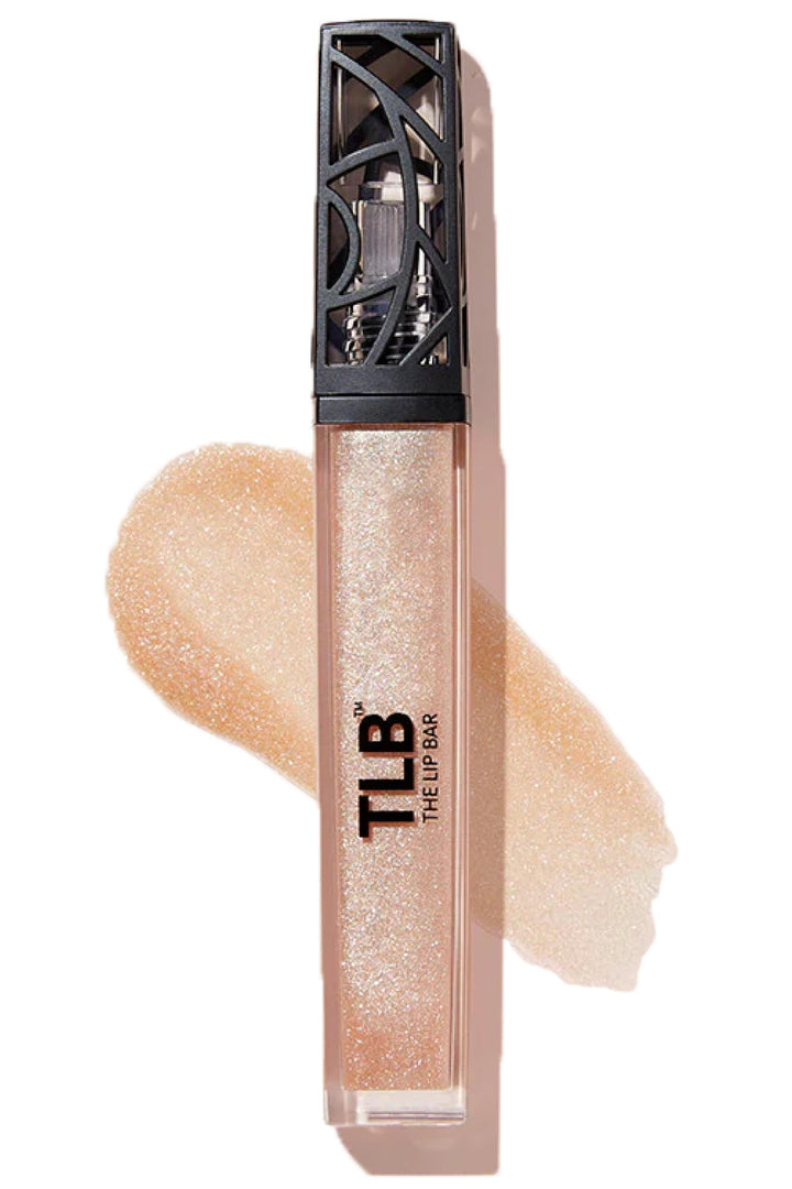 The Lip Bar trophy wife front view showing glossy champagne shimmer and sleek tube