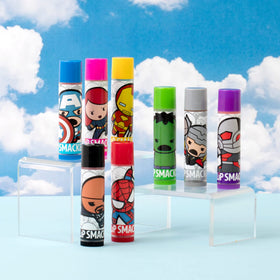 Open Lip Smacker tube revealing clear balm surface and suggested sweet flavor aroma