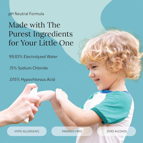 LITTLEY being misted onto child's hands for quick clean on the go