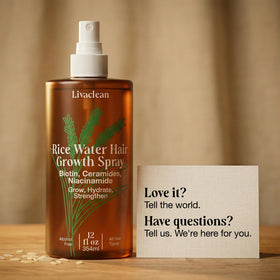 Hand holding LivaClean 12 fl oz bottle to show scale and portability