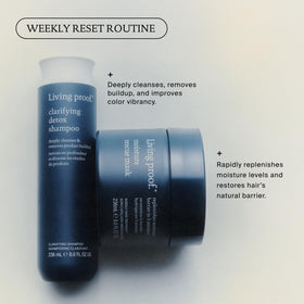 Living Proof bottle in bathroom setting conveying everyday cleansing ritual