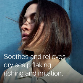 Living Proof dropper dispensing precise dose of serum for targeted scalp relief and minimal waste