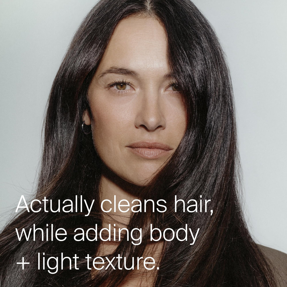 Living Proof spray nozzle close-up for precise, mess-free daily application