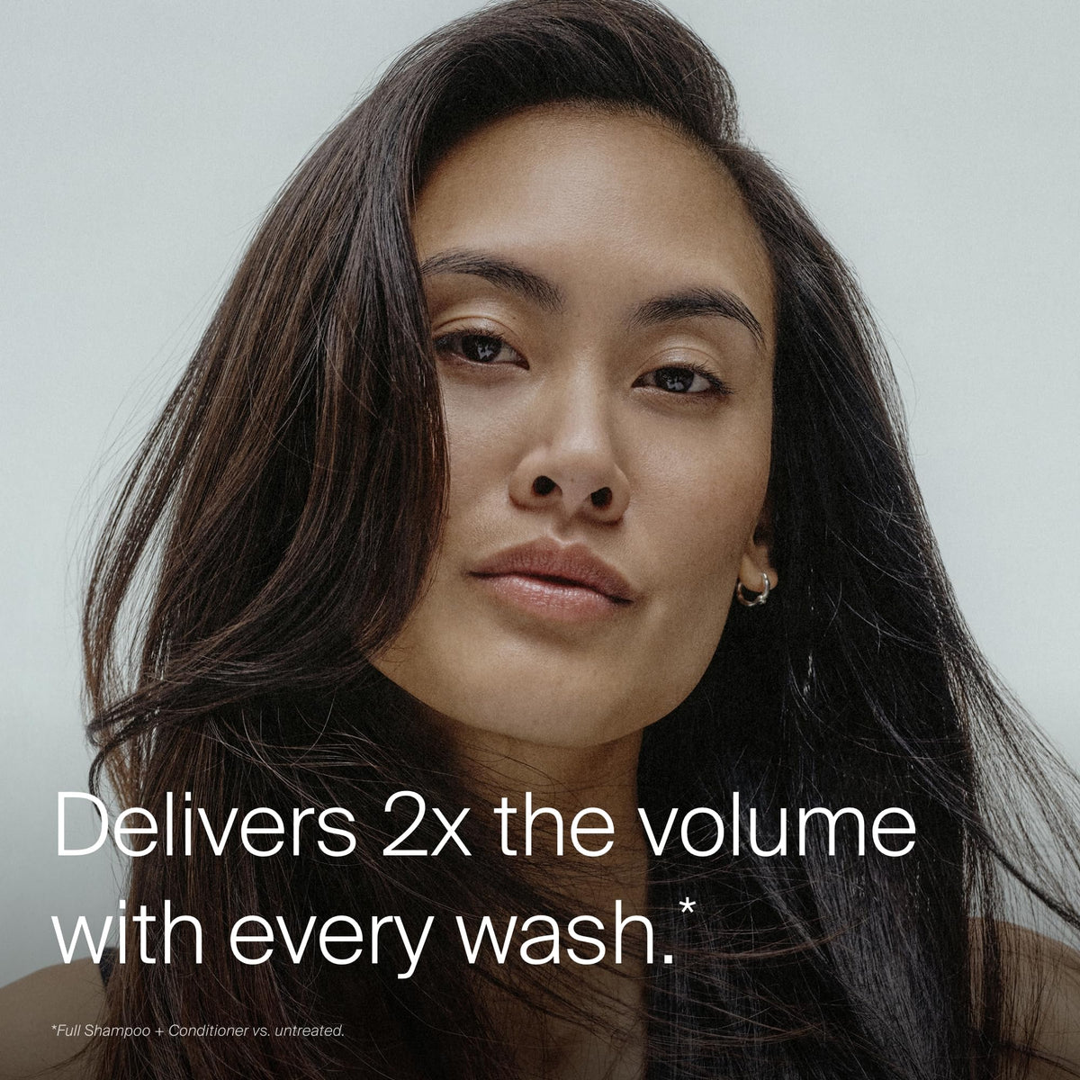 Living Proof creamy conditioner texture shown for smooth application