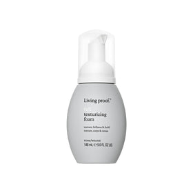 Living Proof bottle front view showing packaging and easy styling benefits