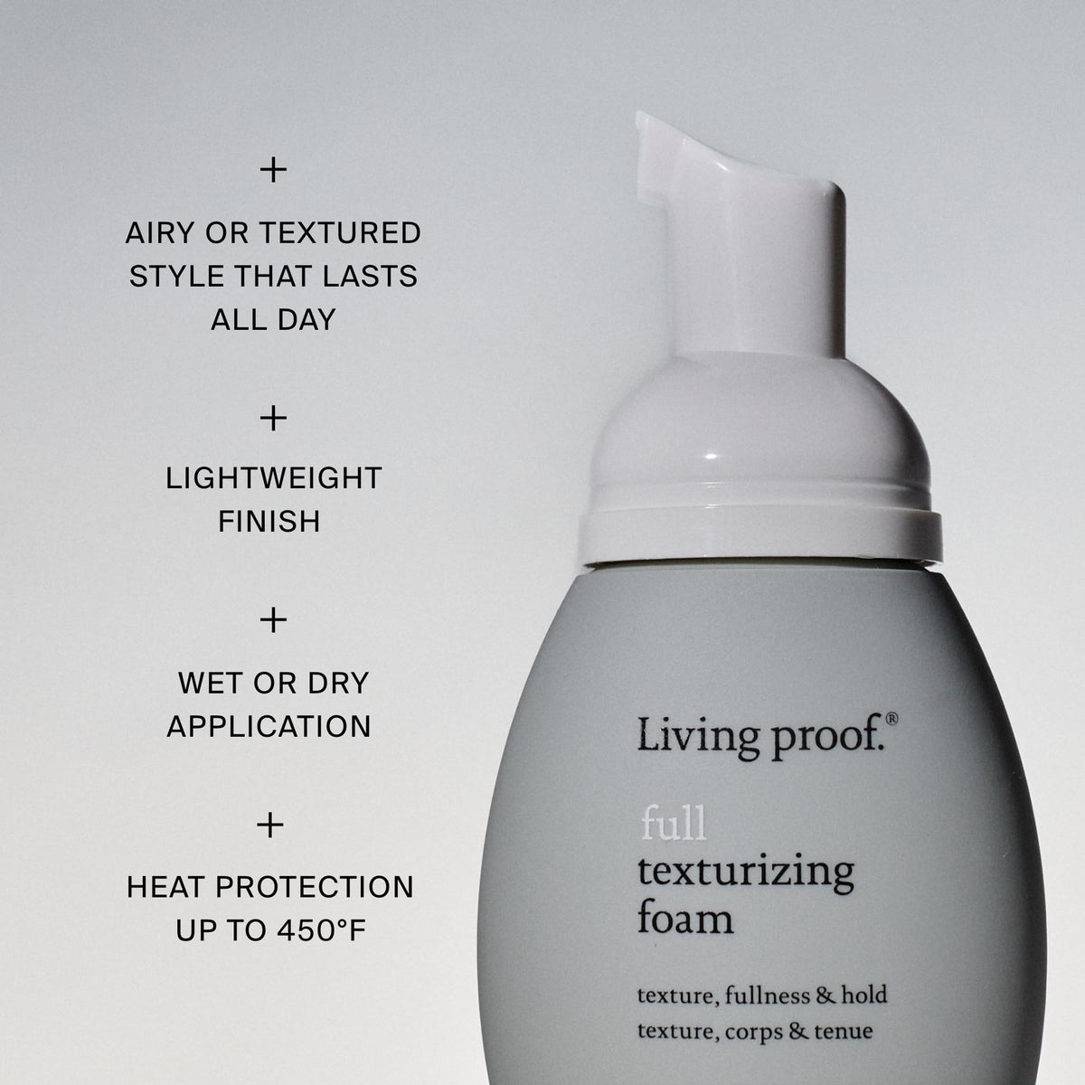 Hand applying Living Proof foam to hair for instant texture and touchable volume