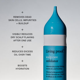 Living Proof bottle in hand for size scale and simple at-home treatment convenience