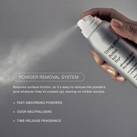 Living Proof in-hand size scale with can to show portability and travel-ready convenience