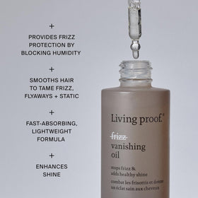 Living Proof applying oil to hands illustrating easy distribution and smoothness